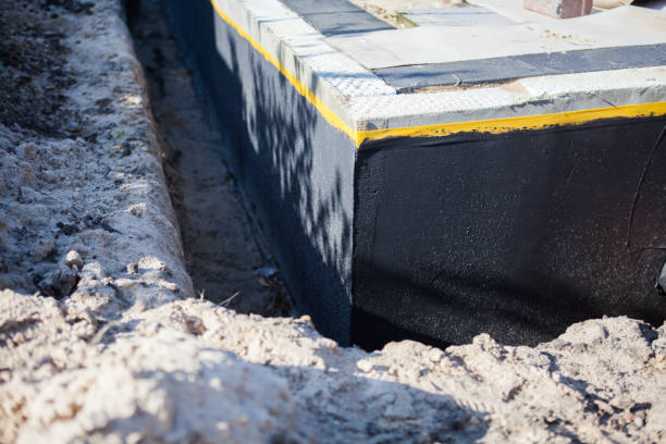 Professional Waterproofing technician working in Hilham, TN
